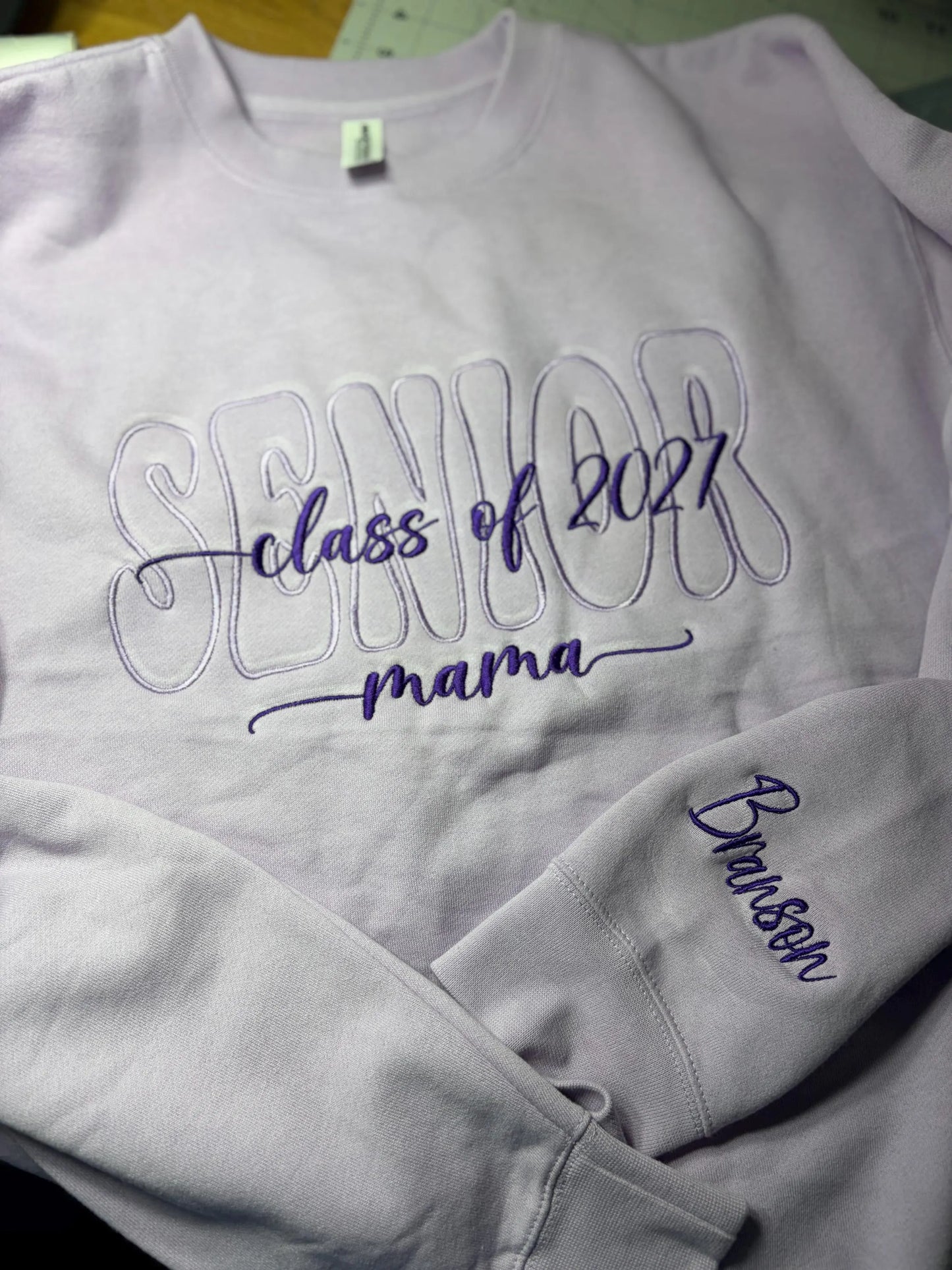 Outline font with overlay embroidered crew