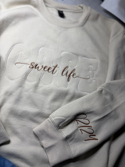 Outline font with overlay embroidered crew