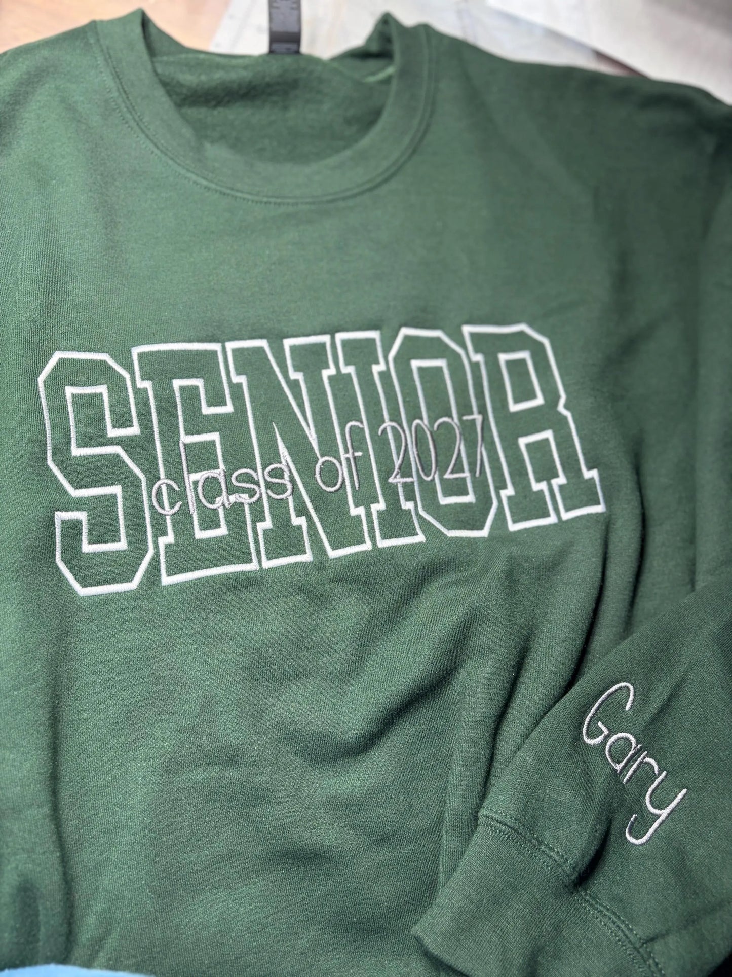 Outline font with overlay embroidered crew